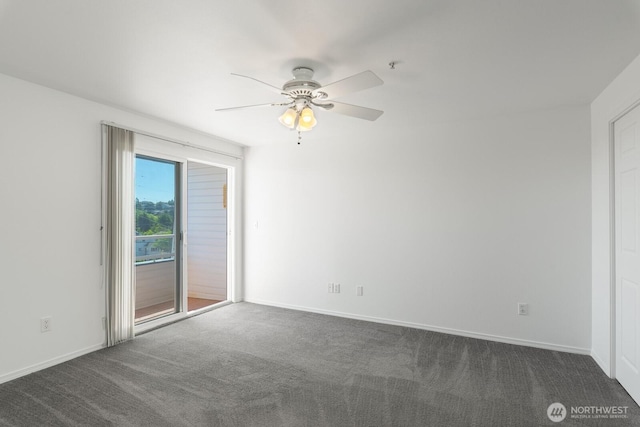 910 34th St Unit 302, Anacortes, WA 98221 - empty room with dark carpet, ceiling fan, and baseboards