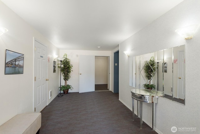 910 34th St Unit 302, Anacortes, WA 98221 - corridor with baseboards and carpet flooring