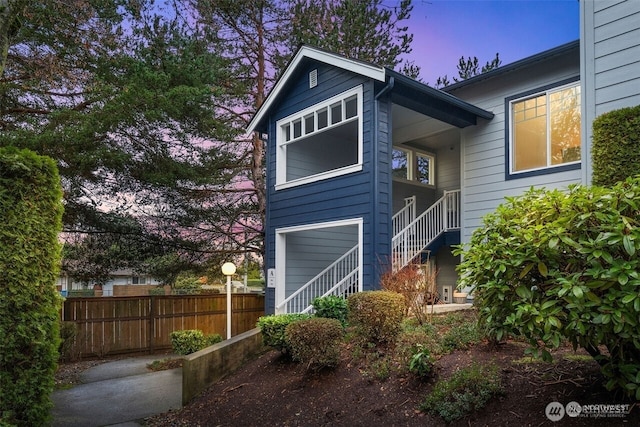 10825 SE 200th St Unit H201, Kent, WA 98031 - rear view of house featuring stairway