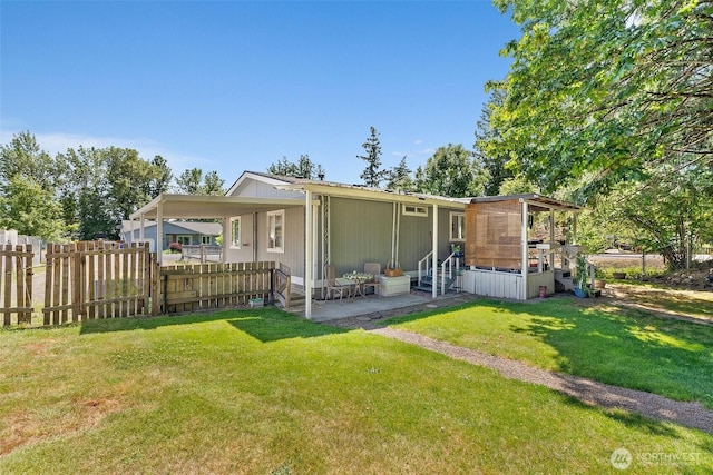 101 Shenandoah Dr, Silverlake, WA 98645 - rear view of property with entry steps and a carport