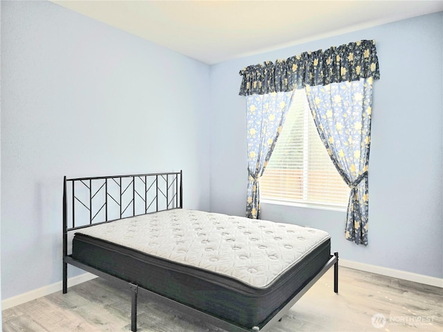 861 Willow Ct SW, Ocean Shores, WA 98569 - bedroom featuring wood finished floors and baseboards