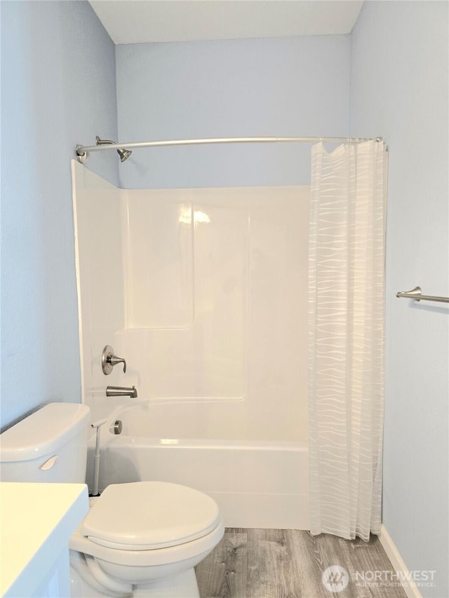 861 Willow Ct SW, Ocean Shores, WA 98569 - full bathroom with shower / tub combo with curtain, toilet, vanity, and wood finished floors