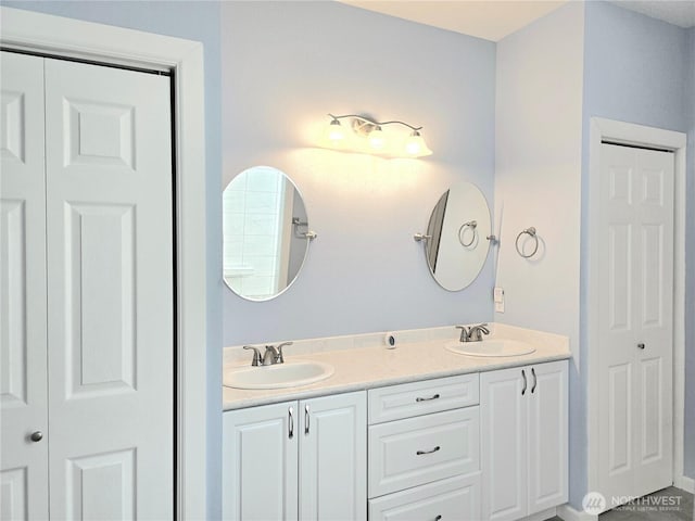 861 Willow Ct SW, Ocean Shores, WA 98569 - bathroom featuring a closet and double vanity