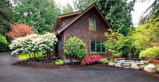 385 Sunset Ave, Orcas Island, WA 98245 - view of side of home with a patio
