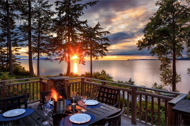 385 Sunset Ave, Orcas Island, WA 98245 - wooden terrace with a water view and an outdoor fire pit