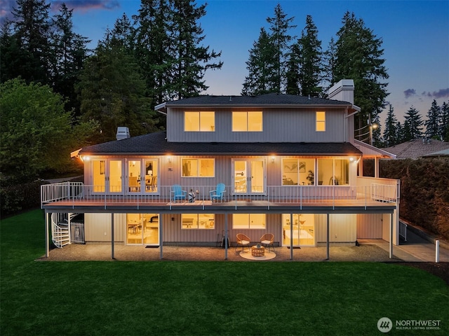 3604 Serene Way, Lynnwood, WA 98087 - back of house with a chimney, stairway, a yard, and roof with shingles