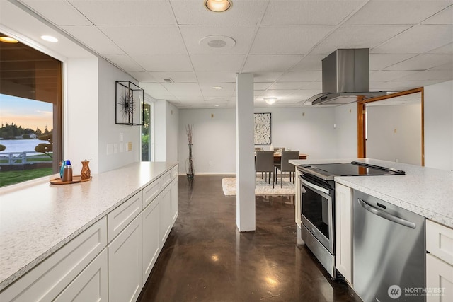 3604 Serene Way, Lynnwood, WA 98087 - kitchen featuring stainless steel appliances, island range hood, concrete flooring, white cabinets, and a paneled ceiling