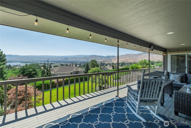 3418 Mari Lane Dr, Wenatchee, WA 98801 - wooden deck featuring a mountain view, a lawn, and outdoor lounge area