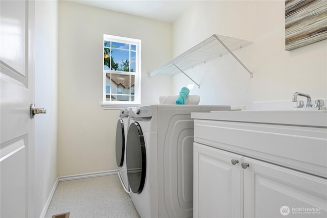 17445 NE 28th St, Redmond, WA 98052 - washroom featuring independent washer and dryer, cabinet space, and light colored carpet