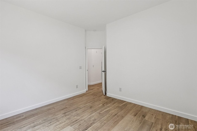2805 Chambers Bay Dr, Steilacoom, WA 98388 - unfurnished room with light wood-type flooring and baseboards