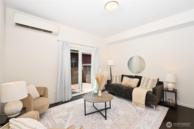 8505A 14th Ave NW, Seattle, WA 98117 - living area with a wall unit AC and wood finished floors