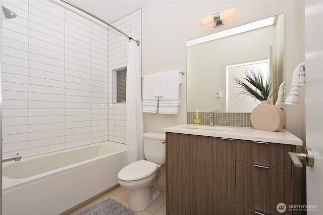 8505A 14th Ave NW, Seattle, WA 98117 - full bathroom featuring shower / bath combination with curtain, vanity, tile patterned floors, and decorative backsplash