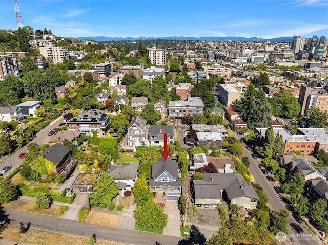 1012 2nd Ave W, Seattle, WA 98119 - aerial view of property's location featuring mountains and nearby urban area