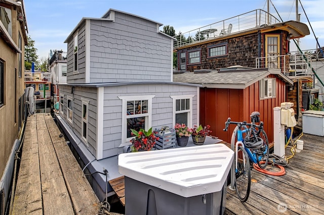 2143 N Northlake Way Unit 11, Seattle, WA 98103 - back of house with a deck and board and batten siding