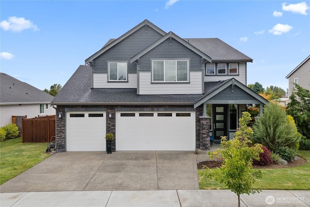 3359 Terry Ln, Enumclaw, WA 98022 - craftsman-style house featuring stone siding, driveway, an attached garage, and roof with shingles