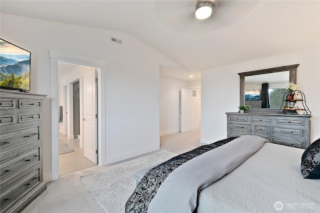 3359 Terry Ln, Enumclaw, WA 98022 - bedroom featuring light carpet, vaulted ceiling, a ceiling fan, and ensuite bath