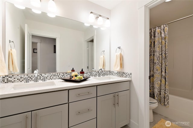 3359 Terry Ln, Enumclaw, WA 98022 - bathroom featuring double vanity, tasteful backsplash, and shower / bath combo with shower curtain