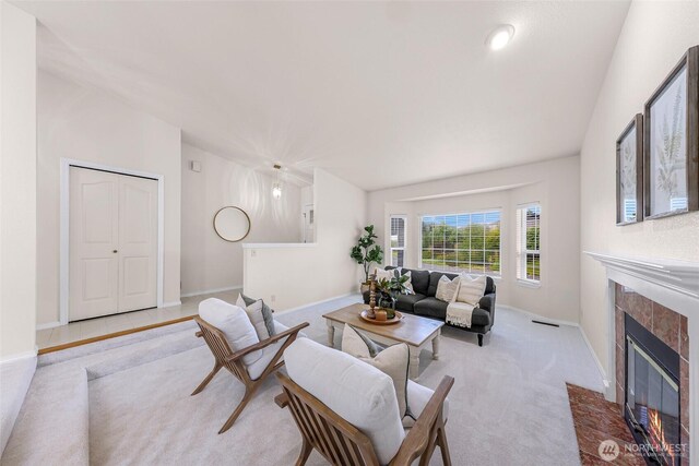 7969 W Golf Course Dr, Birch Bay, WA 98230 - living area featuring a tile fireplace and carpet