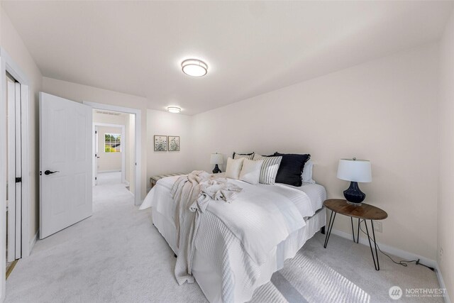 7969 W Golf Course Dr, Birch Bay, WA 98230 - bedroom featuring light carpet and baseboards