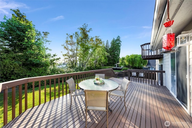 7969 W Golf Course Dr, Birch Bay, WA 98230 - wooden terrace with outdoor dining area and a yard