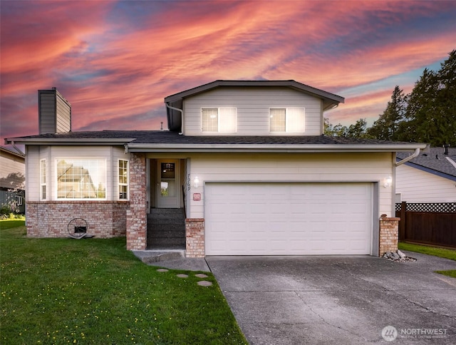 7969 W Golf Course Dr, Birch Bay, WA 98230 - view of front of home featuring a lawn, driveway, a chimney, and brick siding