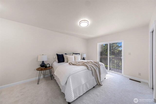 7969 W Golf Course Dr, Birch Bay, WA 98230 - bedroom featuring access to outside and light carpet