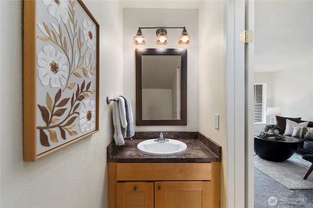 5300 Harbour Pointe Blvd Unit 302G, Mukilteo, WA 98275 - bathroom featuring vanity and a textured wall