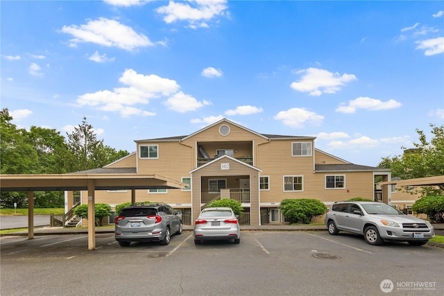 5300 Harbour Pointe Blvd Unit 302G, Mukilteo, WA 98275 - view of front of home featuring covered and uncovered parking and stairway