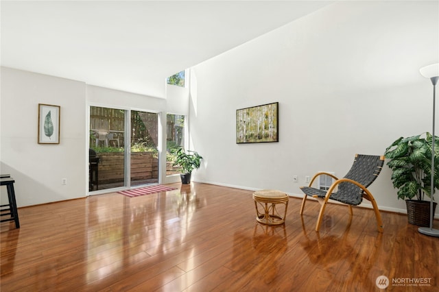 12613 SE 42nd St Unit 613, Bellevue, WA 98006 - sitting room featuring wood finished floors and baseboards