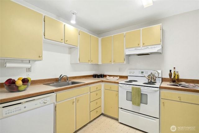 12613 SE 42nd St Unit 613, Bellevue, WA 98006 - kitchen with white appliances, under cabinet range hood, cream cabinetry, and light floors