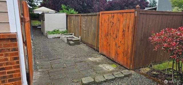 5405 247th St E, Graham, WA 98338 - view of patio / terrace with a vegetable garden