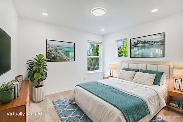14926 Woodland Ave E, Puyallup, WA 98375 - bedroom featuring recessed lighting and speckled floor