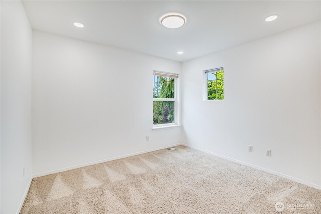 14926 Woodland Ave E, Puyallup, WA 98375 - carpeted spare room with recessed lighting