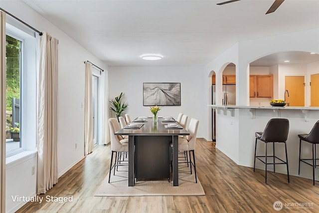 14926 Woodland Ave E, Puyallup, WA 98375 - dining room with light wood-style floors and ceiling fan