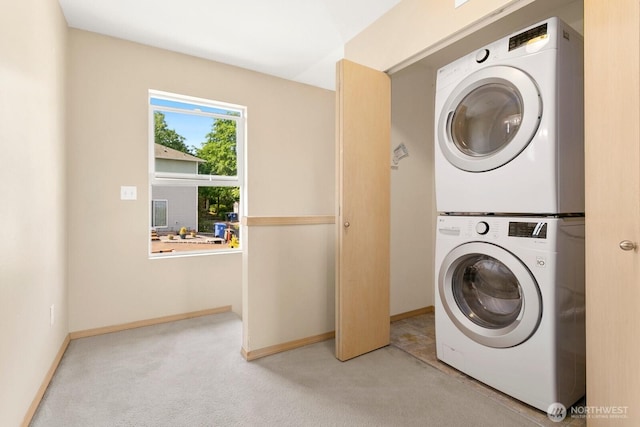 1736 E 39th St, Tacoma, WA 98404 - laundry room with stacked washer / drying machine and carpet floors