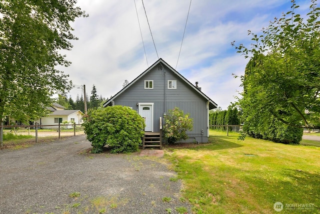 14226 44th St NE, Lake Stevens, WA 98258 - rear view of house featuring board and batten siding