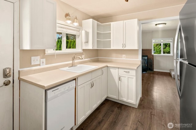 14226 44th St NE, Lake Stevens, WA 98258 - kitchen with freestanding refrigerator, white dishwasher, dark wood-style flooring, white cabinets, and open shelves