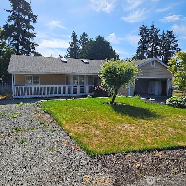 24827 36th Ave E, Spanaway, WA 98387 - back of house with a yard and covered porch