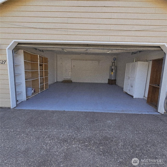 24827 36th Ave E, Spanaway, WA 98387 - garage featuring electric water heater