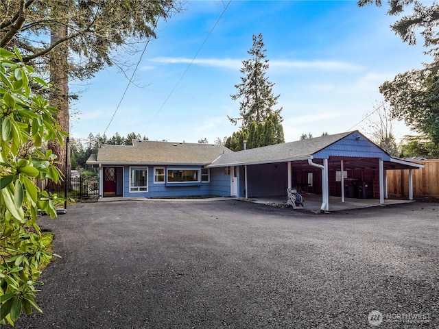 7217 20th Ave SE, Lacey, WA 98503 - ranch-style home with driveway and a carport