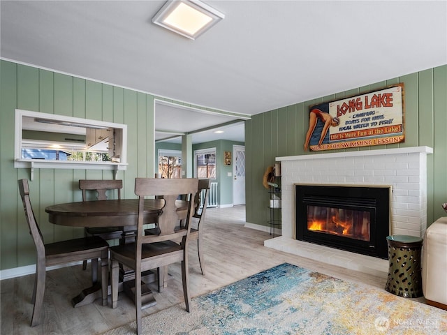 7217 20th Ave SE, Lacey, WA 98503 - dining room featuring wood finished floors and a fireplace