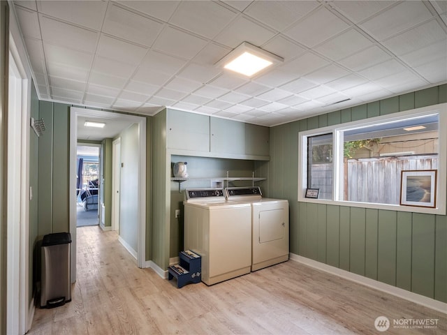 7217 20th Ave SE, Lacey, WA 98503 - laundry room featuring light wood finished floors, plenty of natural light, and washer and clothes dryer