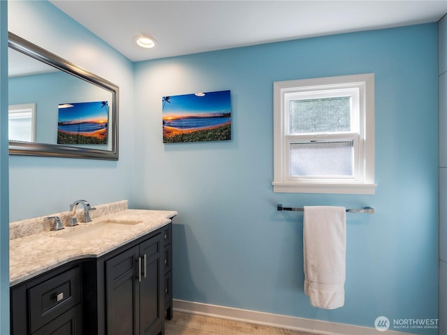 7217 20th Ave SE, Lacey, WA 98503 - bathroom featuring vanity and baseboards
