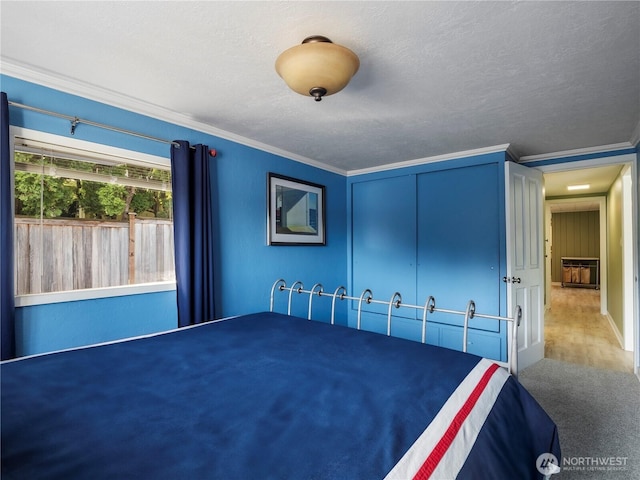 7217 20th Ave SE, Lacey, WA 98503 - bedroom with ornamental molding, a closet, and carpet