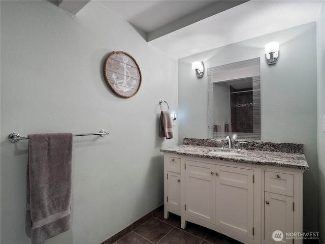 7217 20th Ave SE, Lacey, WA 98503 - bathroom with tile patterned floors, vanity, and a tile shower