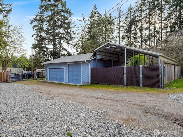 7217 20th Ave SE, Lacey, WA 98503 - detached garage with a carport