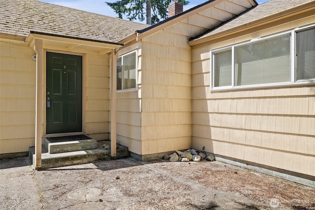 2004 N 143rd St, Seattle, WA 98133 - property entrance with a chimney and roof with shingles