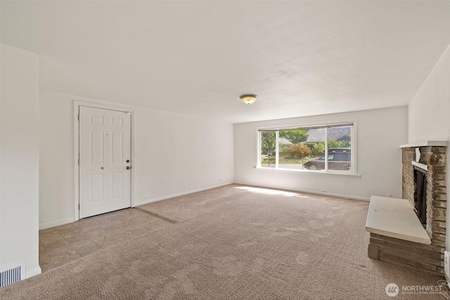 2004 N 143rd St, Seattle, WA 98133 - unfurnished living room featuring carpet and a fireplace with raised hearth