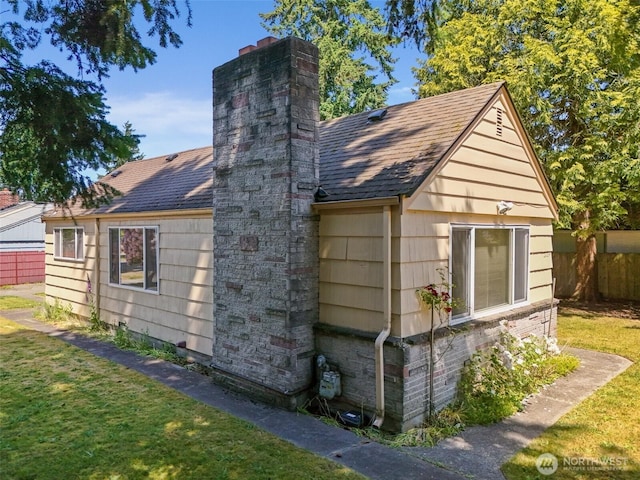 2004 N 143rd St, Seattle, WA 98133 - view of property exterior featuring a chimney and a shingled roof