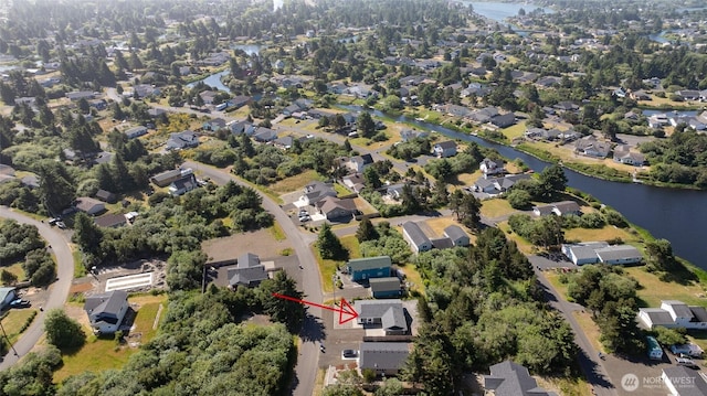 213 N Wynoochee Dr SW, Ocean Shores, WA 98569 - aerial view of property's location with nearby suburban area and a large body of water